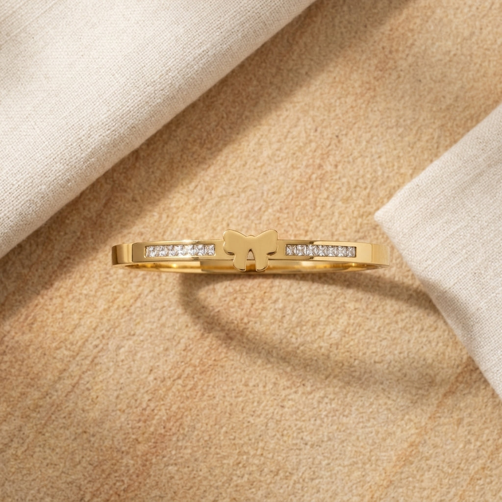 Butterfly Zircon Handcuff — gold-tone bangle with crystal detail