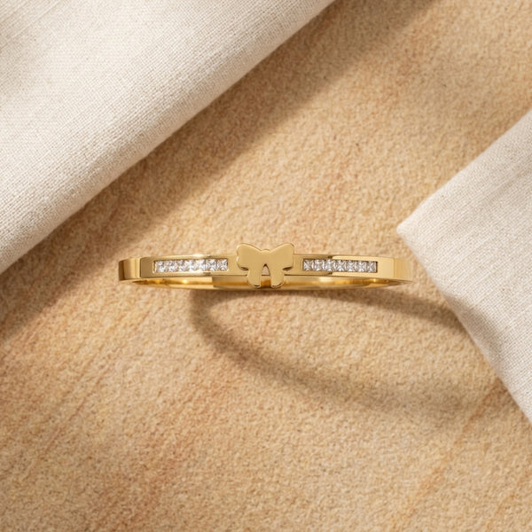 Butterfly Zircon Handcuff — gold-tone bangle with crystal detail