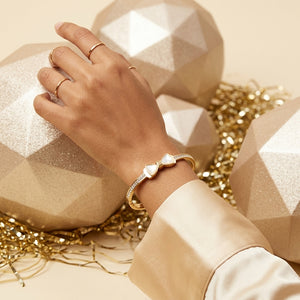 Pearl Bow Zircon Handcuff styled lifestyle shot